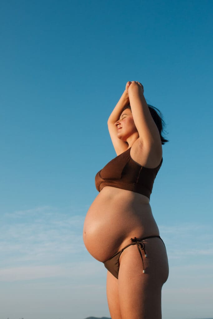 Pregnancy portrait taken on the beach at Byron Bay , Natural light at sunset